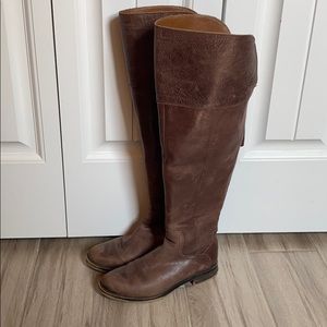 Brown, over the knee riding boots.